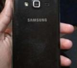 Samsung galaxy grand 2 with charger