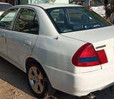 I wont money plz time pass mt 2006 Mitsubishi Lancer petrol 100150 Kms