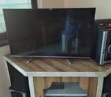 Black Flat Screen TV With Remote