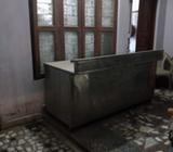 Food counter with utensils and equipment call on